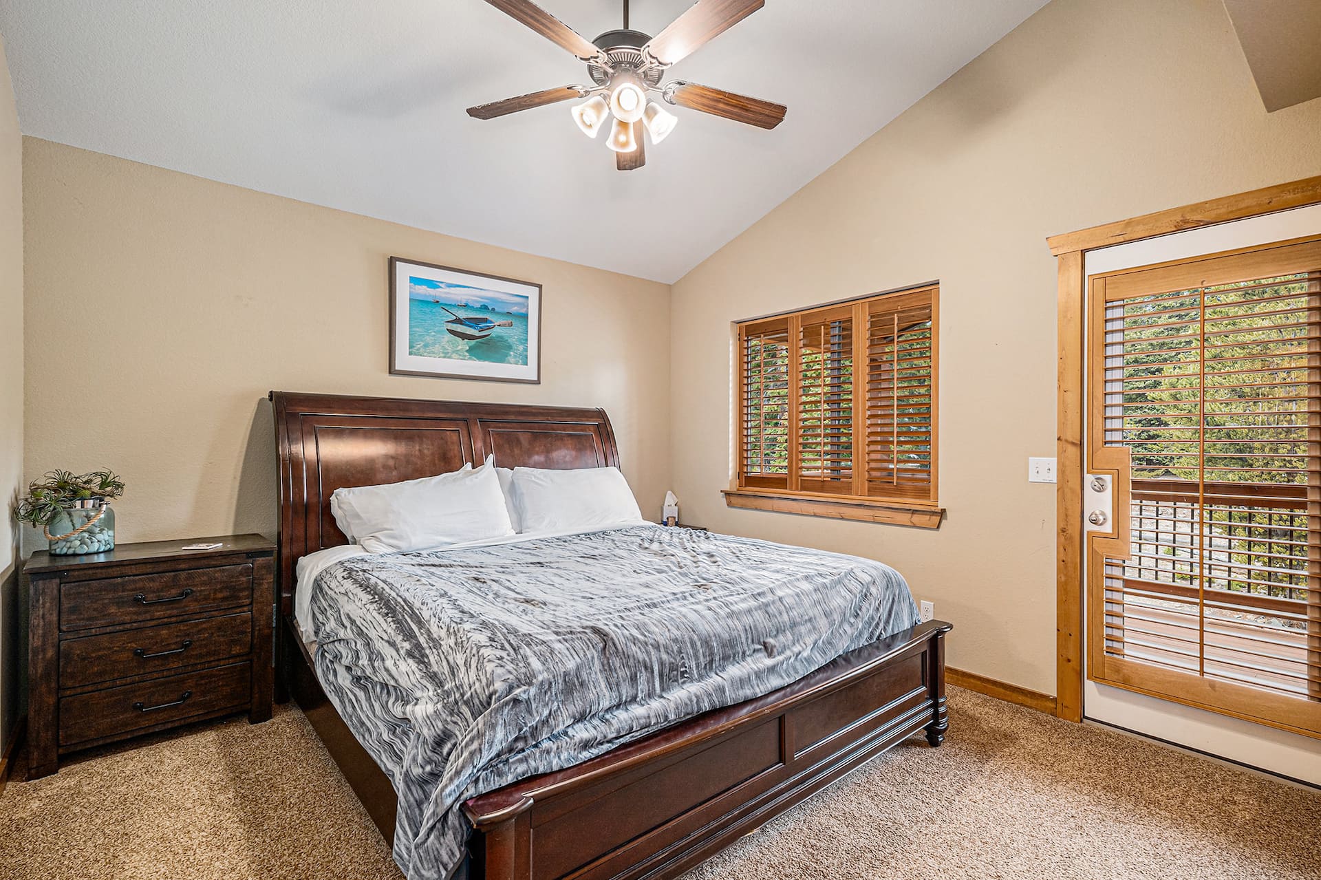 Bedroom 2 with a queen sleigh bed